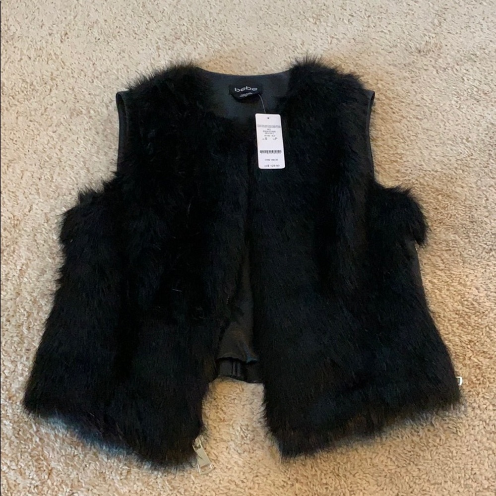 Bebe faux fur vest, never worn!